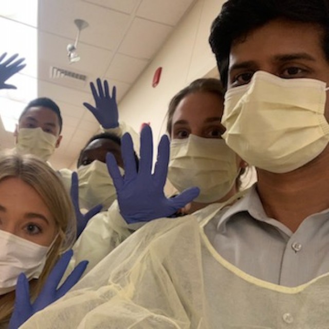 Comer Children&#039;s Interns wearing scrubs at Orientation