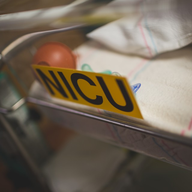 Baby in a bassinet in the NICU