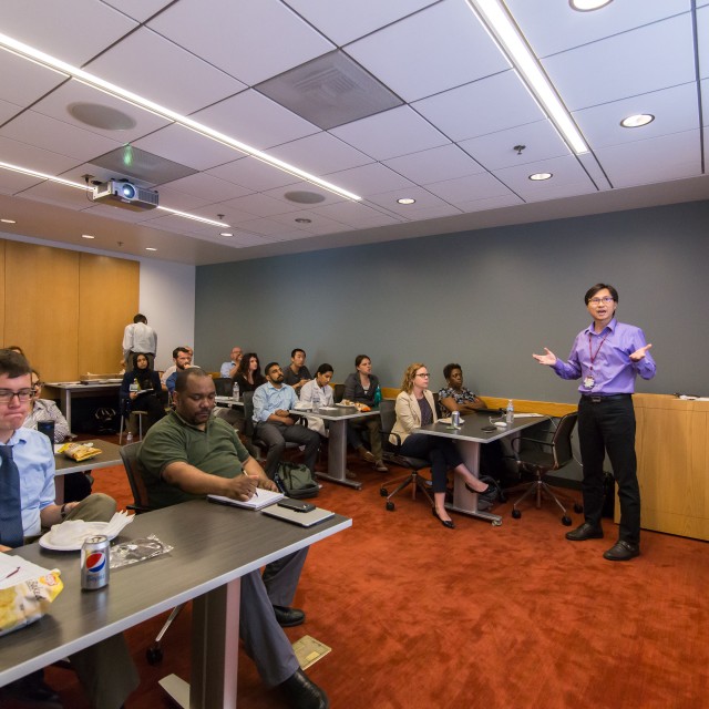 A professor presenting to a classroom