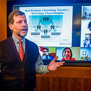 Daniel Johnson, MD, giving a presentation